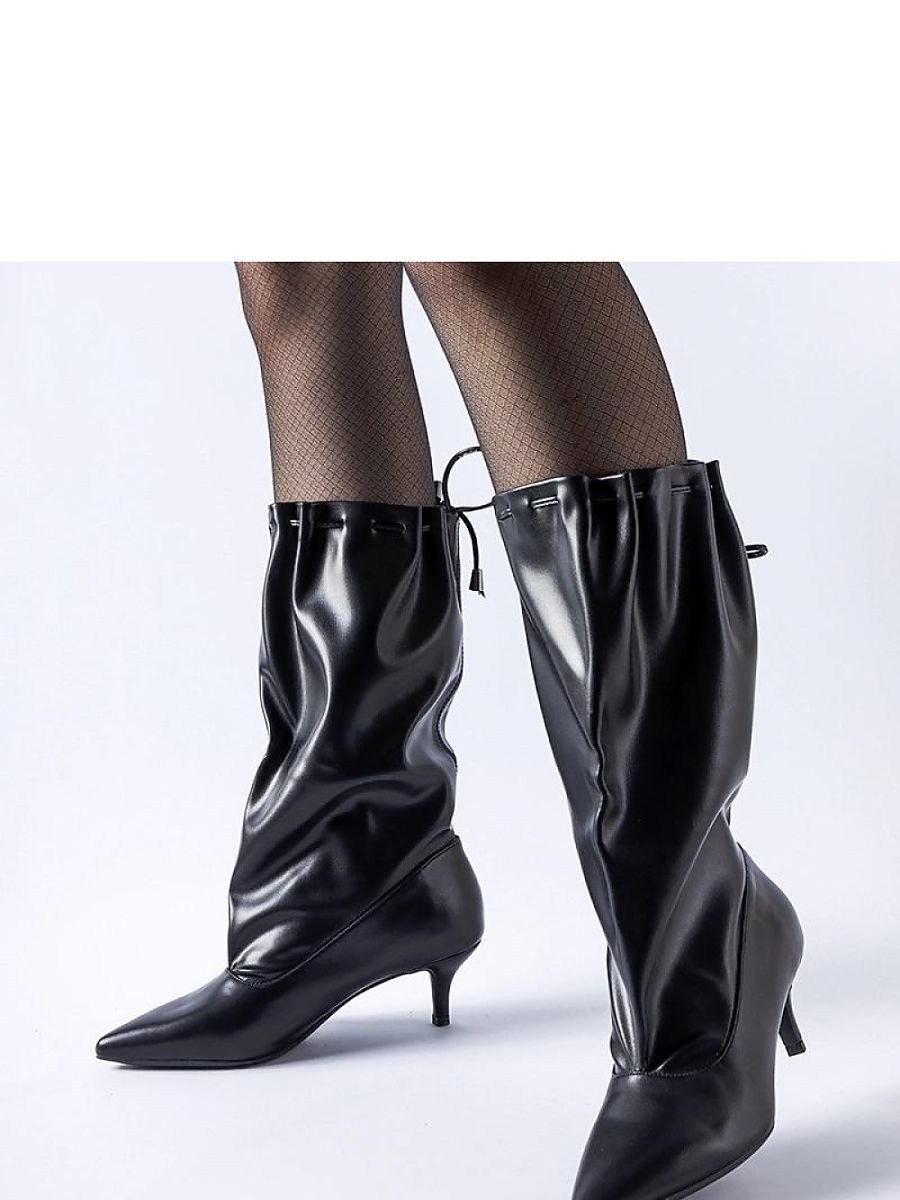 Bottes à talons aiguilles...