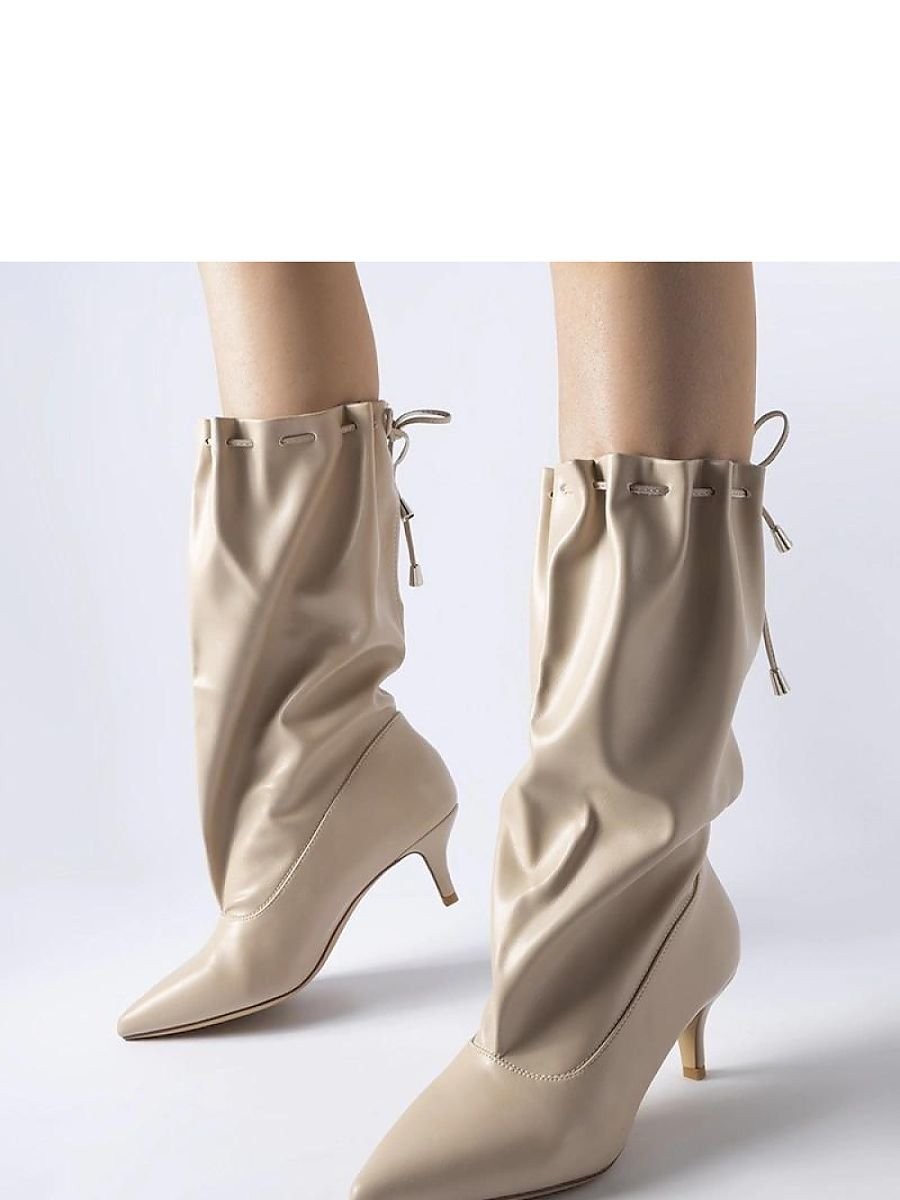 Bottes à talons aiguilles...